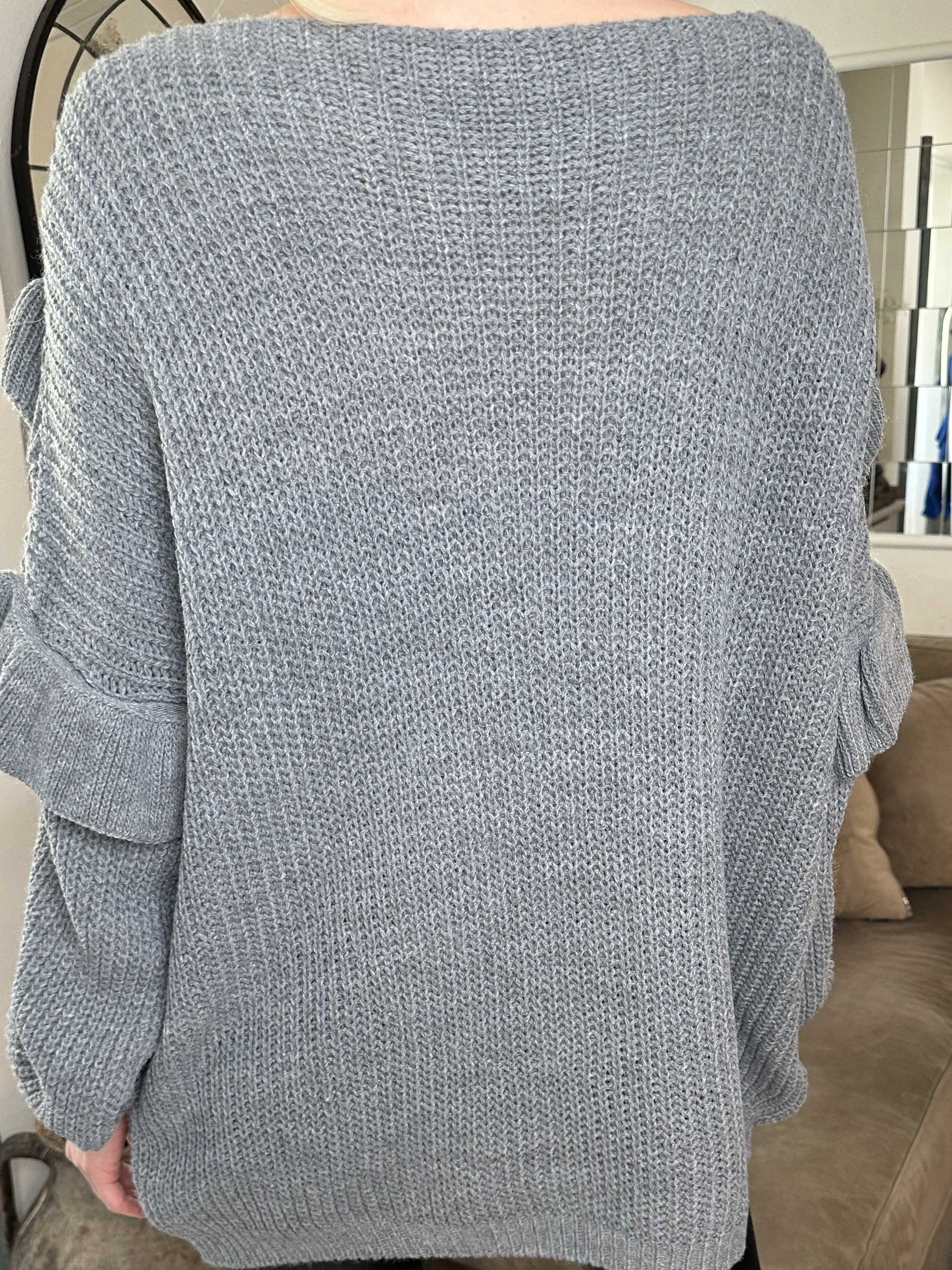 Ellis - Snygg stickad tröja med fina volangdetaljer